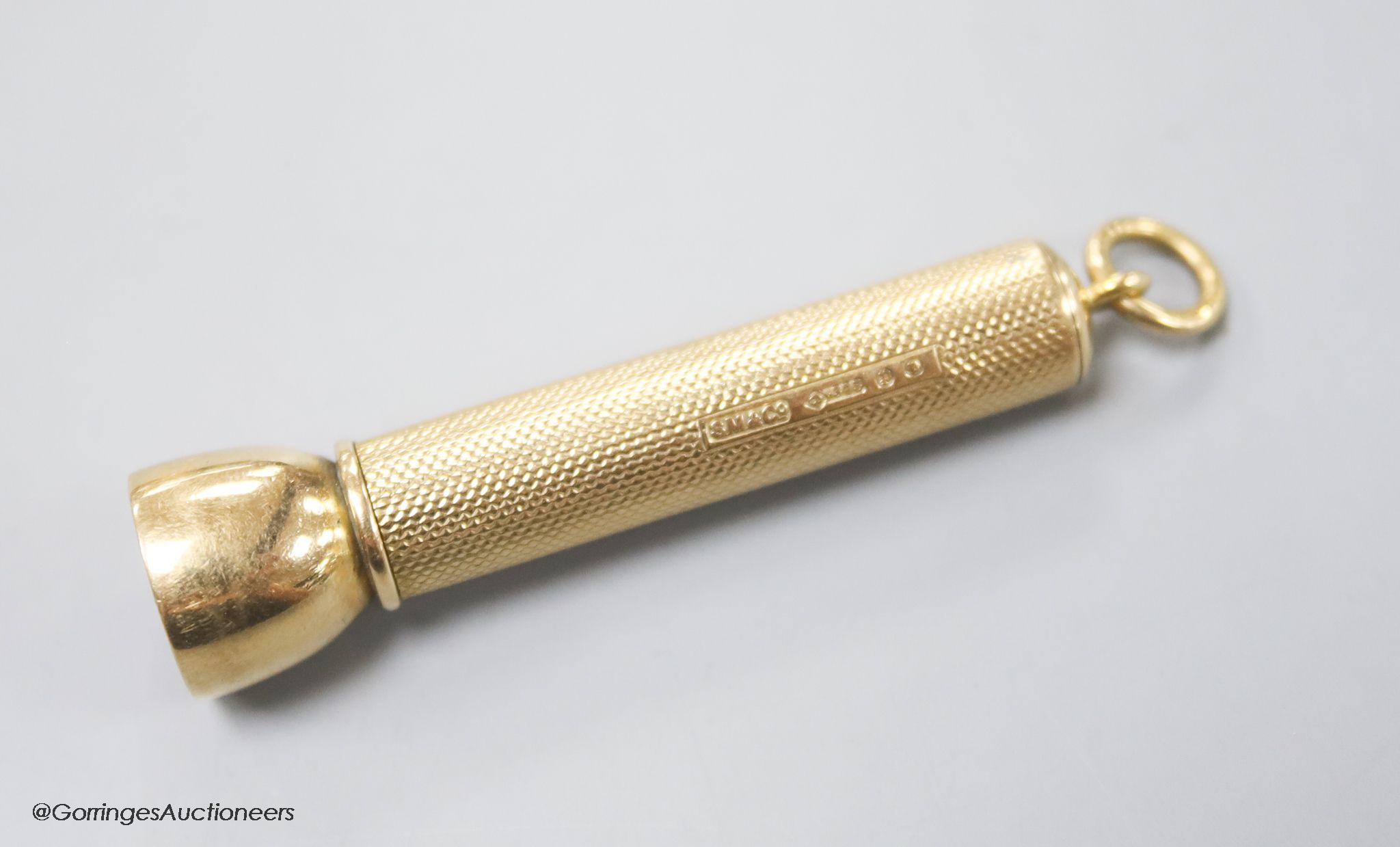 A George V 9ct gold cased cigar piercer by Sampson Mordan & Co, 61mm, gross 14.7 grams.